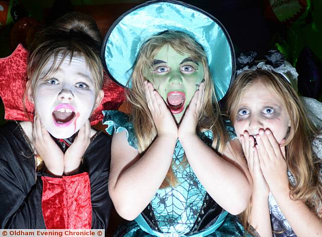SCARY stuff . . . Shannon Evans (9), Jessica Howarth (7) and Leah Silcock (9)