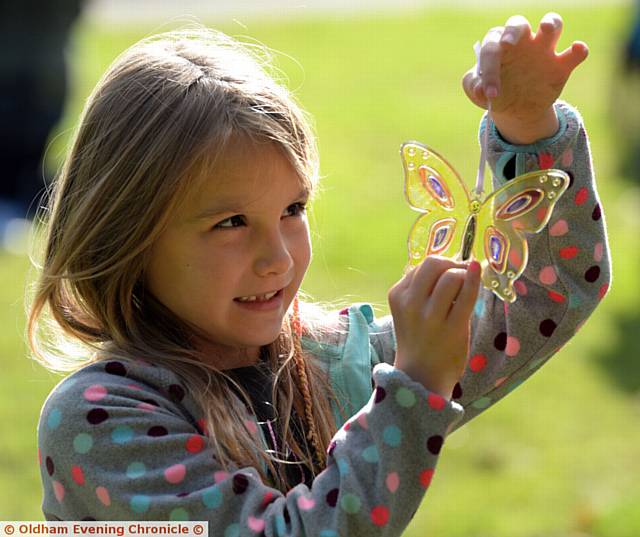 Lizzy Wilson (6) with her butterfly creation