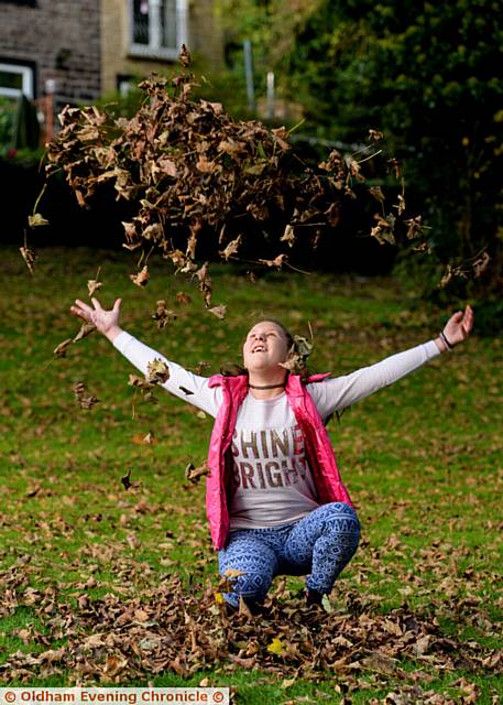 Autumn Craft and Fun at Dunwood Park, Shaw. Natalia Begaj (12) enjoys the autumn sunshine and leaves.