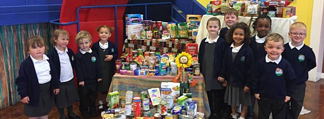 CHILDREN at Hodge Clough Primary, Moorside, have collected lots of tinned and dried foods to donate to Oldham foodbank as part of their Harvest celebrations