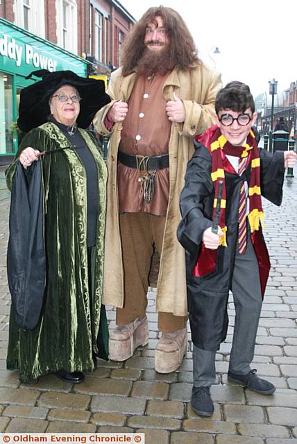 CASTING their spells . . .Professor McGonnagal, Hagrid and Harry Potter, entertained the shoppers
