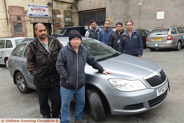 DRIVERS with Delta Cars have come under attack from bricks and stones. Pictured, left, are Abdul Qayoom and Steven Connell with colleagues
