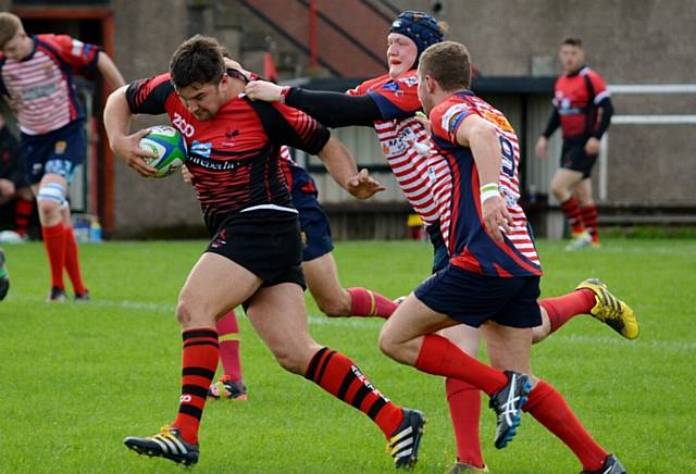 OLDHAM'S Ryan Arundale and Will Mellor chase down an Aspatria attack