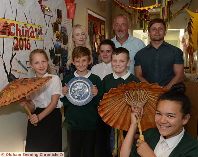 PRIDE in Oldham nominees, the trip to China by staff and pupils at Limehurst Primary School. Staff, from left, Rachel Robertson, Ian Wilson (associate head teacher), Tim Heywood. Pupils, from left, Elizabeth Crofts, Leon Rostron, Bethany Ledger, Kayson Flanagan, Alishyah Warburton