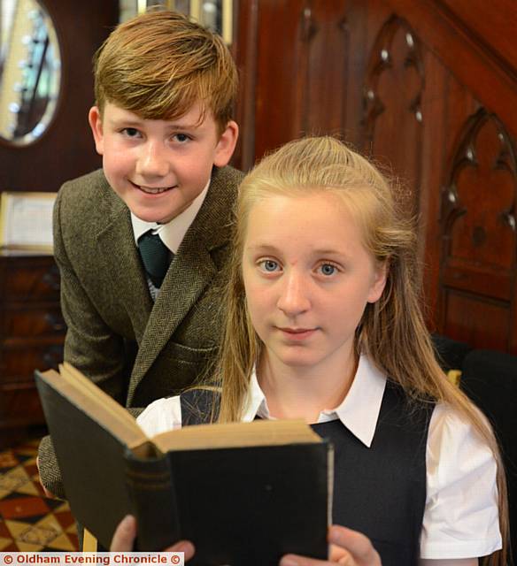 CROMPTON House School pupils Tom Rigg and Beth Martin-Nixon dressed in old-style school uniforms