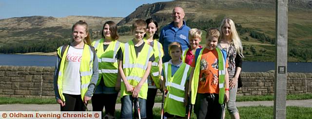 Greg Cookson, has been nominated for a Pride award. Pic shows Greg Cookson, (blue jacket), with the Dovestones rangers youth club, at Dovestones park, Oldham.