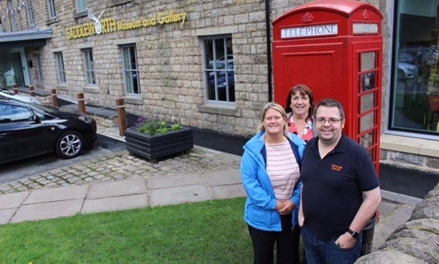 COUNCILLOR Nicola Kirkham, Pam Bailey, clerk to Saddleworth council and Nick Watts, chairman of Uppermill Community Association, outside the phone box