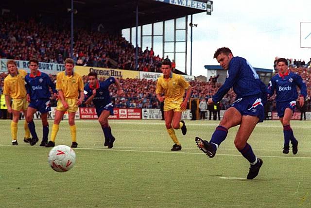 UNFORGETTABLE TIMES . . . Neil Redfearn scores from the spot in THAT game against Sheffield Wednesday