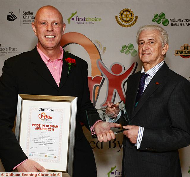 VOLUNTARY Award winner Greg Cookson (left) with presenter Cllr. John Hudson