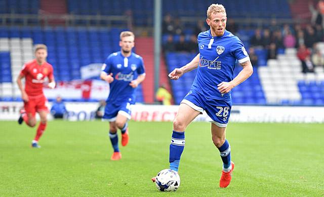 FREE from suspension, midfielder Paul Green is an injury doubt for tomorrow's visit of Peterborough United