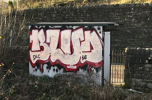 A BUS shelter in Station Road, Diggle was covered in graffiti, along with the storage unit and nearby wall 