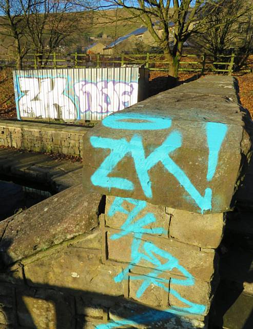 THE storage cabin  in Diggle and nearby wall have both been vandalised.