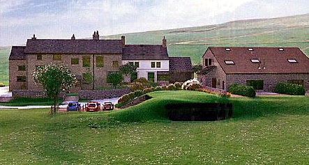 The proposed development in Delph (next to the cars).