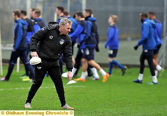 LET’S GET STARTED . . . John Sheridan gets stuck in at his first training session 