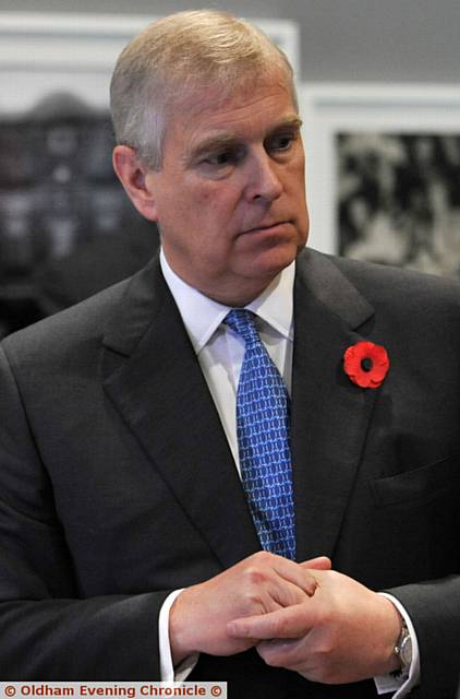 LISTENING with interest . . .Prince Andrew in Oldham yesterday
