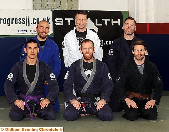 HEADING FOR PORTUGAL . . . Stealth Brazilian Jiu-Jitsu Club members, from left to right, back: Roberto Mura, Peter Wilson, Phil Russell. Front: Nemil Malczewski, Steve Campbell, Jake Corrigan.