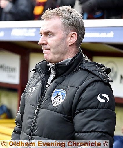 AT THE HELM . . . John Sheridan looks on at Valley Parade during his first game back in charge of Latics. Picture by ALAN HOWARTH.