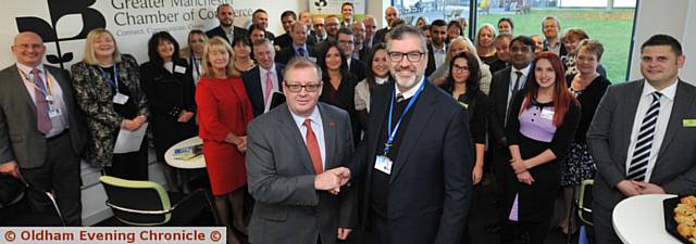 Oldham College launches business lounge for Greater Manchester Chamber of Commerce members. PIC shows (front) L-R: Clive Memmott (Chief Exec of GM Chamber of Commerce) and Alun Francis (Oldham College principal)..
