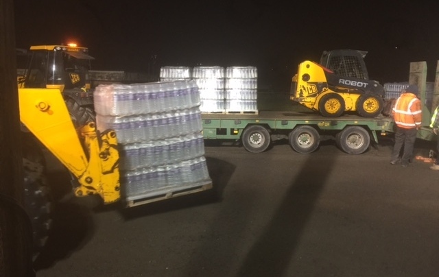 UNITED Utilities staff load water on to lorries at 5am today