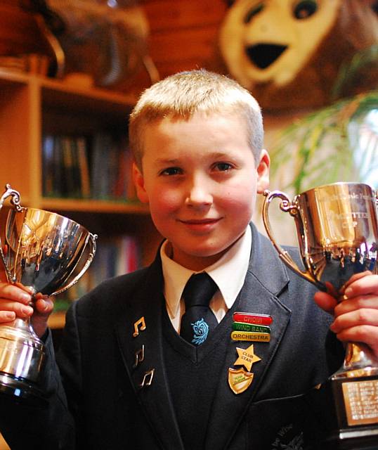 SAM FITZSIMONS with some of his trophies