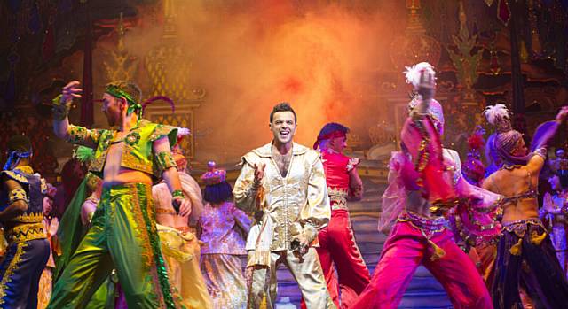 Ben Adams (Aladdin) exercises his vocal cords in this year's big-budget Opera House panto