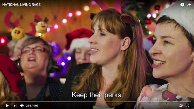 MP Angela Rayner joins her party in a Christmas single, 'National Living Rage', accusing businesses of cutting workers' perks since the National Living Wage was introduced.