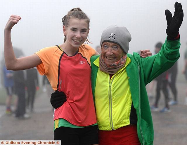 MAKING TRACKS: runners try to make good progress at the Oldham parkrun. Pictured (left) is one of the youngest runners in the race, Megan Lewis (aged 14), with one of the oldest, Louise Gilchrist (83).