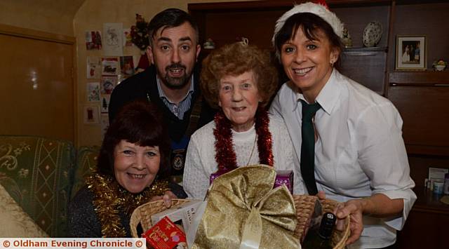 FLASHBACK - Christmas Wish recipient Rena Edwards. Left to right, Marilyn Muir (nominated Rena), Matthew Sykes (Chairman of Saddleworth Round Table), Rena Edwards, Gill Morris (Paul's Quality Meats, Uppermill)..
