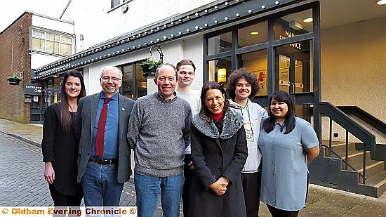 OUTSIDE Oldham Coliseum Theatre with MP Debbie Abrahams are (l-r) Carly Henderson, the theatre’s head of learning and engagement, executive director David Martin, artistic director Kevin Shaw and James Butler, Alex Tigo and Ammerun Nessa, members of the teaching theatre