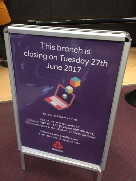 A sign showing the closure date for Uppermill's Natwest bank