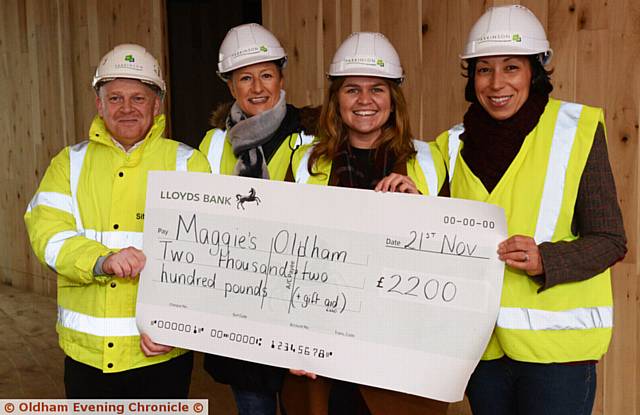 PRESENTATION of cheque for £2,200 to Maggie's Oldham by runner Sharon Livesey. From left, Wayne Sutherland (site manager), Jo Taylor (centre visitor), Laura Tomlinson (fundraising manager), Sharon Livesey
