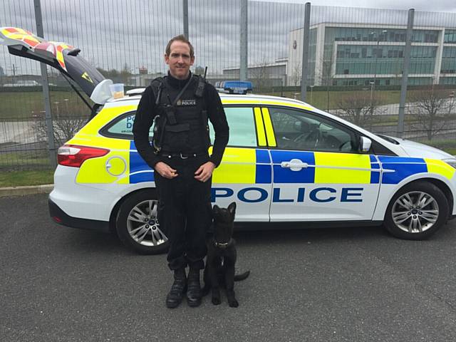 Police Dog Luther and handler PC Phil Monaghan