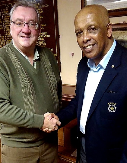 CHAIRMAN Nigel Tench welcomes new Pennine Cricket League president John Holder.