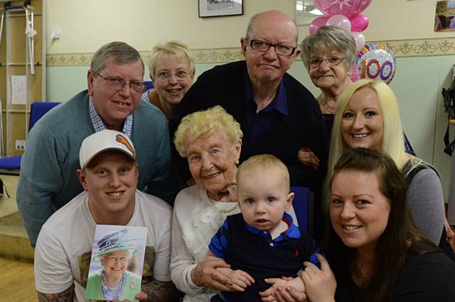 Eva Radcliffe celebrates her 100th birthday with family and friends at Walkers Road Community Centre, Hollinwood. Back left to right, Peter Radcliffe (son), Jennie Radcliffe (Peter's wife), David Radcliffe (son), Dorothy Radcliffe (David's wife), Angela Preston (Mark Radcliffe's partner). Front left to right, Mark Radcliffe (grandson), Eva Radcliffe, Lucas Crowther (15 months, Eva's great grandson), Lisa Radcliffe (Lucas's mum and Peter's daughter)..