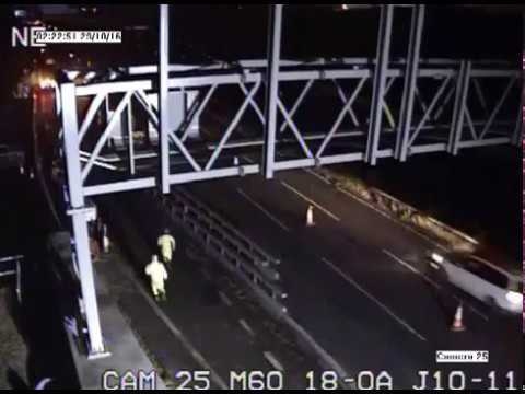 Highways England has released CCTV footage showing a driver ignoring an overnight slip road closure at junction 11 of the M60 at Eccles, where he is seen being chased through the construction area by shocked road workers.