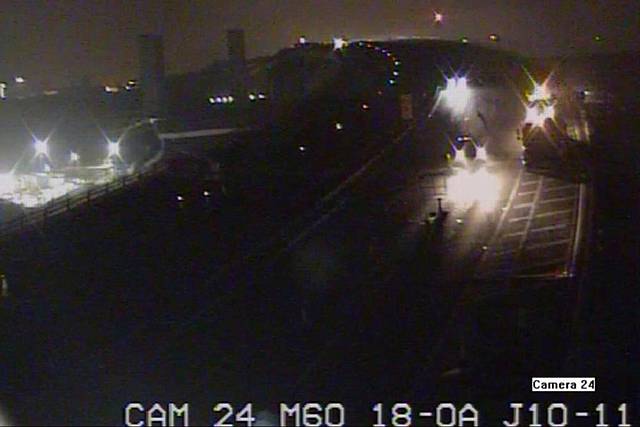 Highways England has released CCTV footage showing a driver ignoring an overnight slip road closure at junction 11 of the M60 at Eccles, where he is seen being chased through the construction area by shocked road workers.