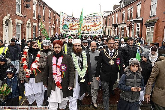 THE Mayor, Councillor Ateeque Ur-Rehman, helps to lead the procession