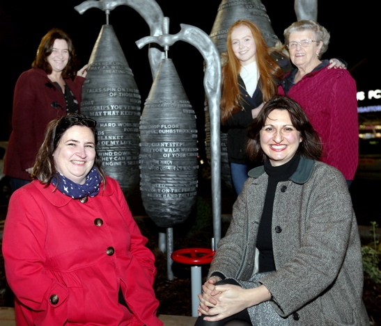 Elk Mill’s new artwork The Spinners. PIctured are (rear, l-r) Elizabeth Poole, Erin Monaghan and Avis Morris, with writer Cathy Crabb and artist Emma Hunter (front right). 