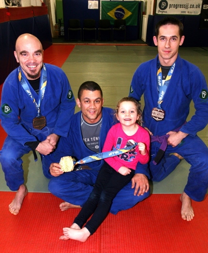 MEDAL HAUL . . . from left: Roberto Mura, David Minto and daughter Ava, aged seven, and Emil Malczewski. Not on photo: Phil Russell.