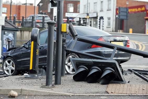 The Mercedes ploughed through road furniture at the junction