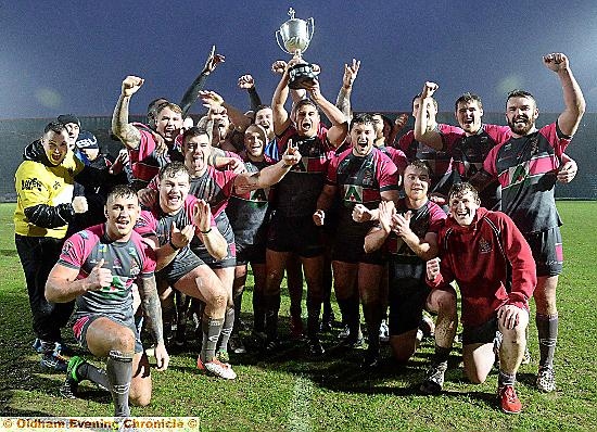 SILVER SUCCESS . . . Oldham RL celebrate Law Cup victory over Rochdale at Spotland. PICTURE by TIM BRADLEY.