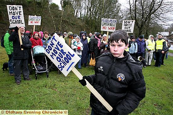 Save Diggle action group march through Uppermill with Saddleworth School pupil George Brooks