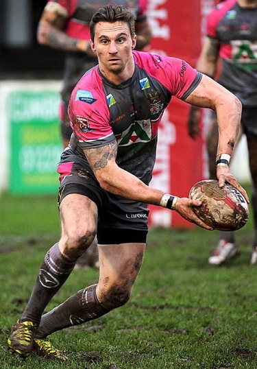 NOT FAR FROM HOME: Oldham half-back Danny Grimshaw has a short trip to make to Featherstone on Sunday afternoon.