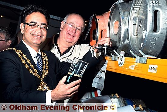 BARREL of laughs . . . Oldham Mayor, Councillor Ateeque Ur-Rehman, with organiser Peter Sheldon
