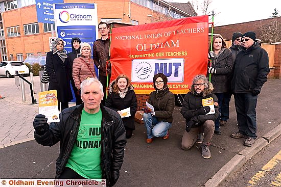 SAVE our colleges . . . Oldham NUT branch secretary Nigel Yeo with fellow union members on the picket line at Oldham Sixth Form College