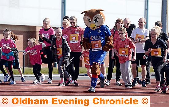 READY, set, go!.... Runners, including Chaddy the Owl, set off at Oldham’s Sport Relief Mile
