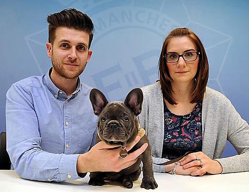 Rob and Victoria Hollingsworth with recovered pup Frankie