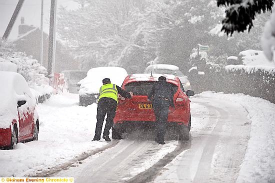 A CAR stuck in Stockport Rd, Lydgate.