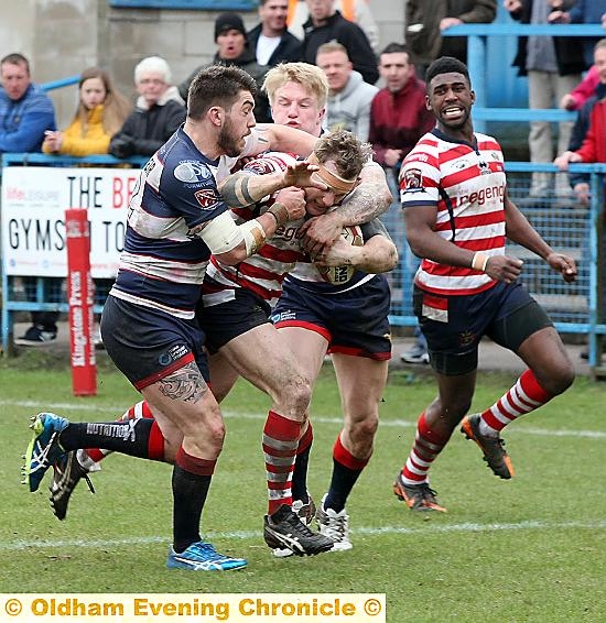 ON THE CARRY: Oldham full-back Richard Lepori tries to break through. PICTURES by PAUL STERRITT.
