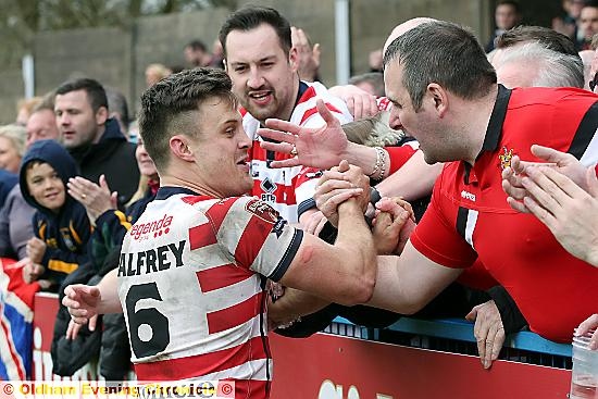 YOU’RE THE MAN . . . it’s handshakes all-round for Oldham skipper Lewis Palfrey after the thrilling defeat of Sheffield Eagles. PICTURE by PAUL STERRITT.